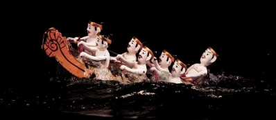 Assister à un spectacle marionnettes sur l'eau après visite lac Hoan Kiem