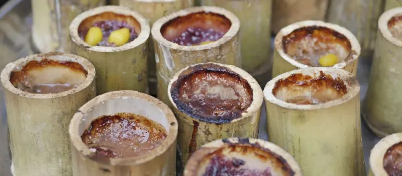 Partez en voyage au Laos pour d&eacute;guster la sp&eacute;cialit&eacute; Khao Lam &agrave; bambou